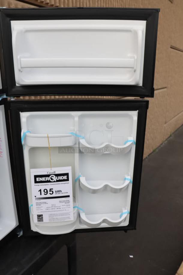 New Danby 3.1MF7-7B1 MicroFridge, black, 3.1 cu. ft., dual door, with microwave. EnerGuide label: 195 kWh/year.