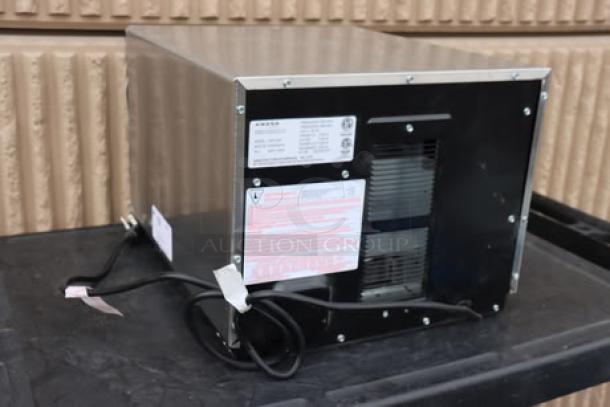 BRAND NEW Amana HDC12A2 Heavy Duty Commercial Microwave, 120V, 1200W, minor top dent, door slightly misaligned. S/N: 2505110537.