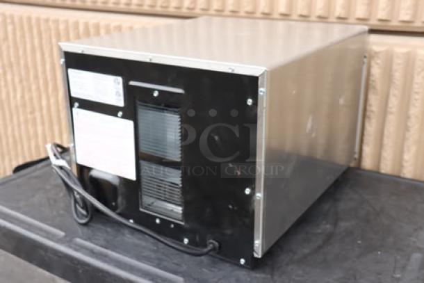 BRAND NEW Amana HDC12A2 stainless steel commercial microwave, 120V, 1200W. Minor dent top right; slightly misaligned door.