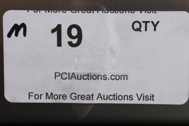 Sticker displaying "19 QTY," website link "PCIAuctions.com," and auction promotion text.