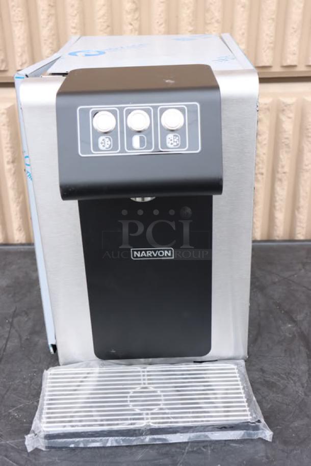 Narvon 23BCWD8 countertop water dispenser, new, offers chilled, ambient, and sparkling water. Silver finish, scratch-and-dent condition.
