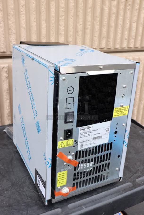 BRAND NEW Narvon 23BCWD8 water dispenser, 8 GPH, offers chilled, ambient, sparkling options. Tags show S/N 2503113357.