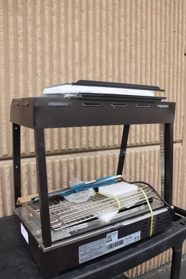 Avantco HDC-26 heated display case, 3 shelves, sliding doors, 120V, 1580W, serial CK-250210R-687, frame bent.