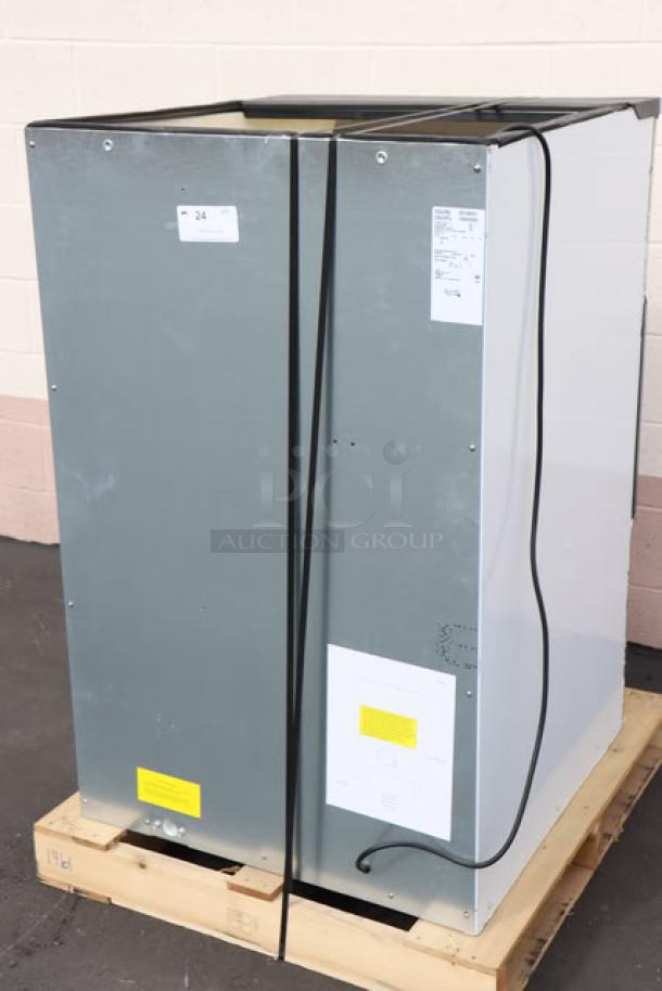 Brand new Avantco Ice HBN180-30 hotel ice dispenser, 180 lb capacity, 115V. Minor scratches and dents, tags visible.