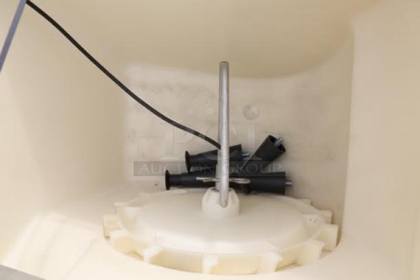 Avantco Ice HBN180-30 hotel ice dispenser interior, showing dispensing mechanism. Item out of packaging, minor scratches.