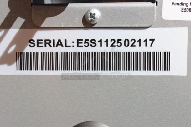 BRAND NEW Seaga ENV5S Vending Machine, 40-item ambient, 115V, 4A, 1-phase. S/N: E5S112502117. Front glass shattered.