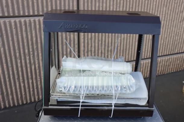 Brand new Avantco HDC-26 heated display case, 26", 3 shelves, sliding doors, scratch-n-dent condition, 120V, 1580W.