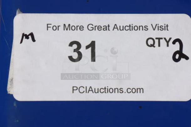 Sticker on auction item with text: "For More Great Auctions Visit PCIAuctions.com, 31, QTY 2."