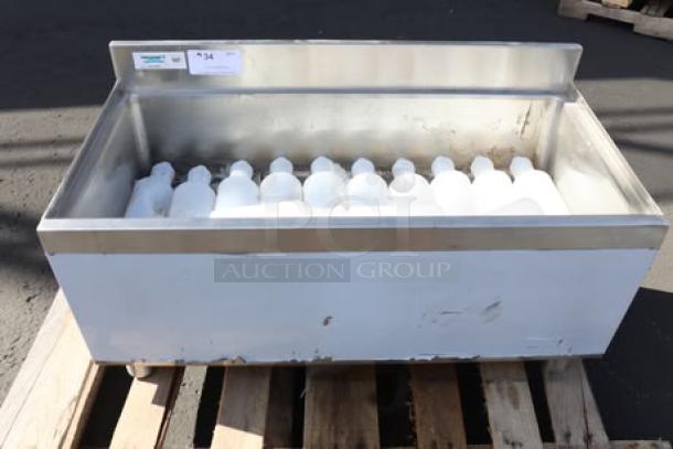 Regency IB1836-CPT 18" x 36" underbar ice bin with 7 circuit post-mix cold plate, 79 lb capacity, new with scratches.