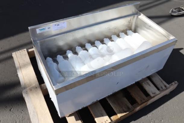 Regency IB1836-CPT 18" x 36" underbar ice bin with cold plate, scratch-n-dent, 79 lb capacity, visible label on side.