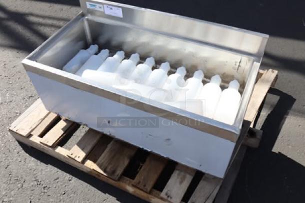 Brand new Regency IB1836-CPT underbar ice bin with 7 circuit post-mix cold plate, minor scratches, 18"x36", 79 lb capacity.