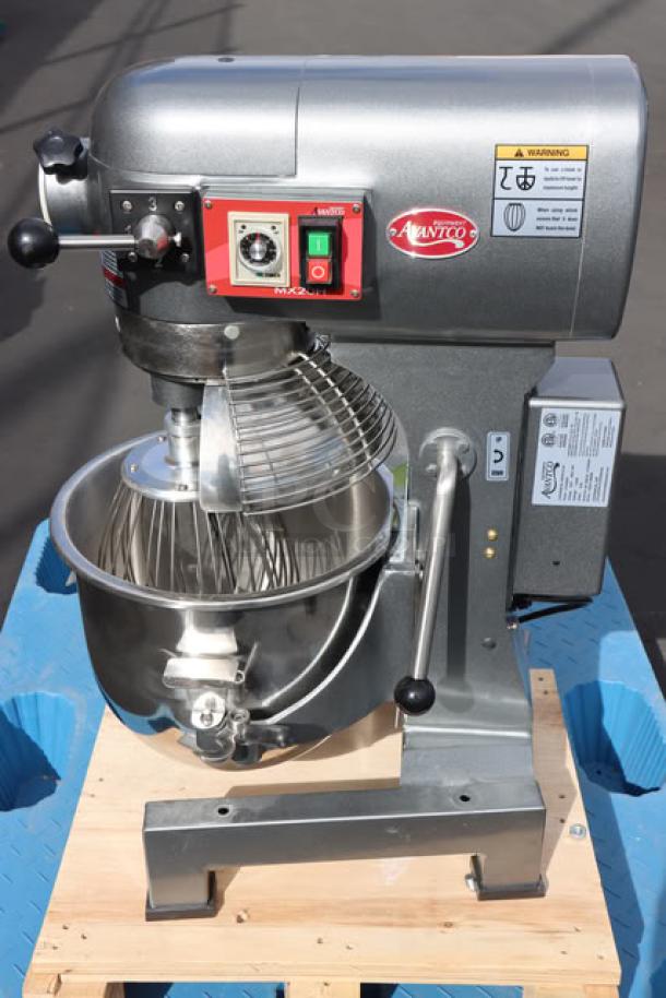 Brand new Avantco MX20H 20 Qt. planetary stand mixer with guard, standard accessories, and visible brand markings.