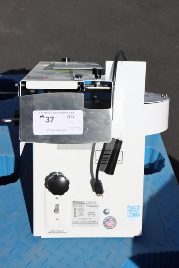 DoughXpress DXSM-270 Bun/Bagel Slicer, adjustable slice thickness 1/2" to 1 1/2", 120V, 1/2 hp. Out of packaging, with labels.