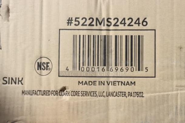 Barcode and manufacturing information on Steelton PQ830 stainless steel mop sink packaging, with signs of damage.