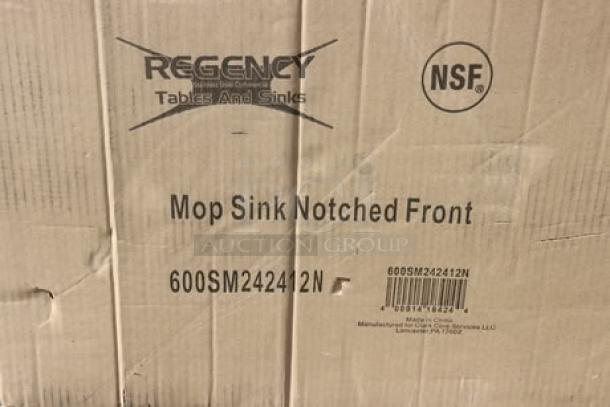 Brand new Regency 600SM242412N mop sink with notched front. Features 16-gauge stainless steel, 24"x24"x12" bowl. Box label shows model and NSF certification.