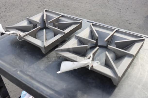 Brand new Vulcan 00-925000 grates, 36 inch, showing minor scuffs. Two pieces, out of packaging, durable metal construction.