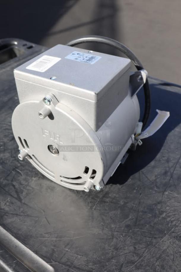 Brand new Blodgett 32291 motor, 1/3hp 115v 2spd, out of packaging. Model label visible on top.