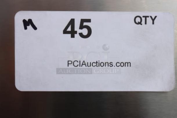Label on Vollrath 40716 electric griddle. Includes quantity "45" and PCIauctions.com URL. Griddle is scratch-and-dent.
