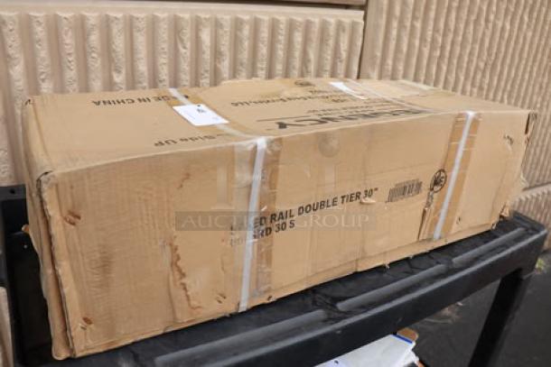 Regency Spec Line 600SRD30S 30" stainless steel double tier speed rail in torn original box. Box shows "Speed Rail Double Tier 30" markings.