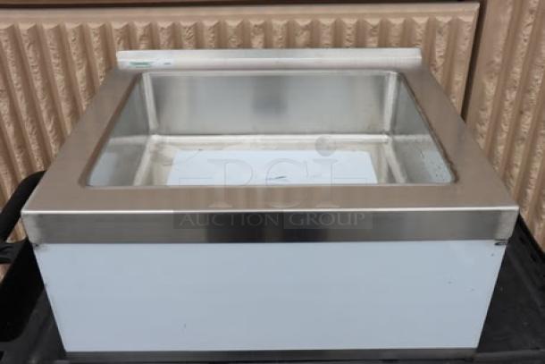 Regency 600SM16206 stainless steel mop sink, 25" x 20" x 16", one compartment. New condition with possible minor scuffs.