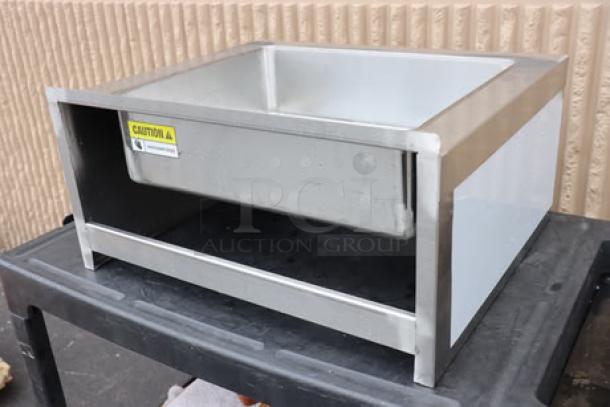 Brand new Regency 600SM16206 25" one-compartment mop sink in stainless steel; minor scuffs, original packaging damaged.