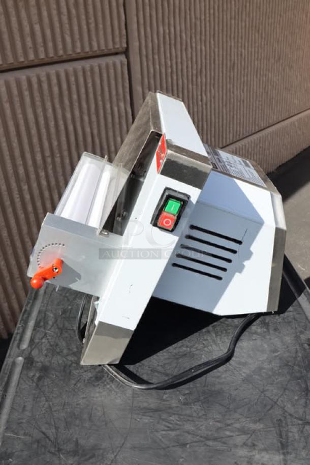 Brand new Estella EDS12S countertop dough sheeter, 12", 120V, 1/2 HP. Features visible control switches, S/N: DR-2S-901449-002.