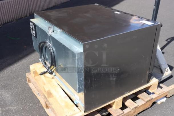 Cooking Performance Group COF-T4-M electric countertop convection oven, 4 tray, moisture injection, 208-240V, model shown on wood pallet.