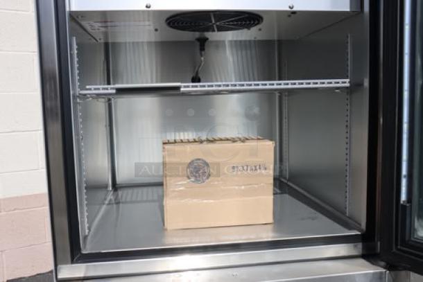 Brand new True T-23DT-G-HC~FGD01 27" glass half door fridge/freezer; includes adjustable shelves; minor cosmetic marks.