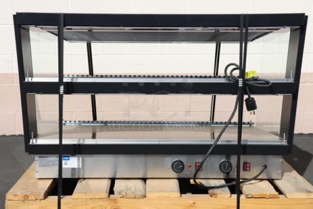 Brand new ServIt OAM-121D 42" 2-shelf heated display merchandiser, 1860W, 120V, out of packaging, serial number visible.