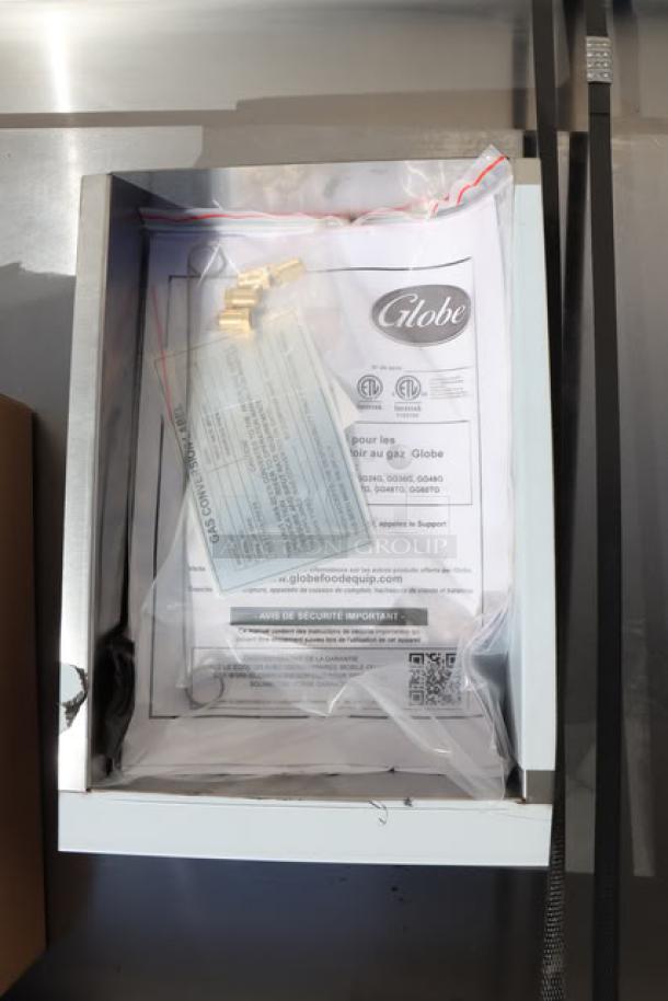 BRAND NEW Globe GG48G 48" Gas Griddle, 120,000 BTU. Missing one knob, minor scratches/dents. Includes manuals and components.