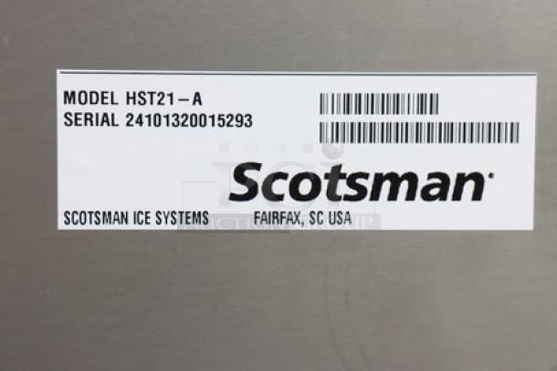 Scotsman HST21-A stainless steel ice dispenser stand label with serial number 24101320015293, Fairfax, SC USA.