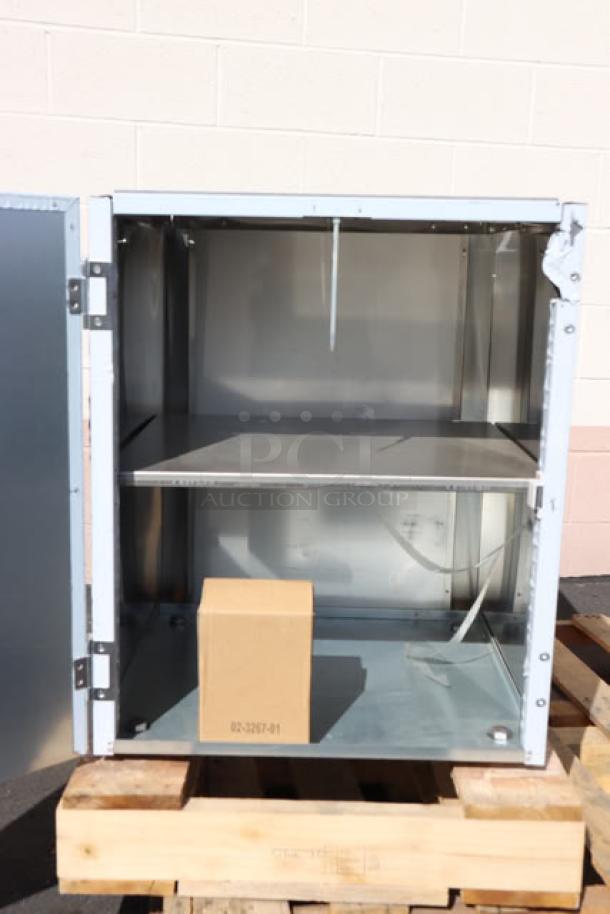 Brand new Scotsman HST21-A stainless steel ice dispenser stand with door. Dented back left corner. S/N: 24101320015293.