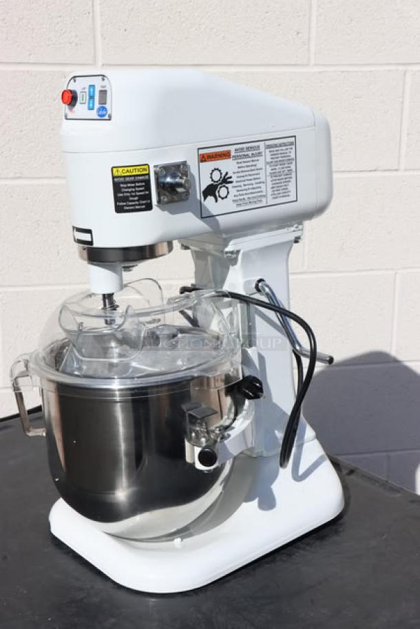 Brand new Globe SP08 8 Qt. countertop mixer with guard, 120V, 575W, 1/4 hp. Features bowl lift, standard accessories. S/N: 7025626.