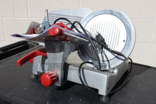Berkel B10-SLC 10" light-duty manual meat slicer, 1/4 hp, scratch-n-dent, gravity feed, 115V, new condition.