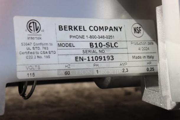 Label on Berkel B10-SLC meat slicer shows model, serial number EN-1109193, voltage, and certification logos.