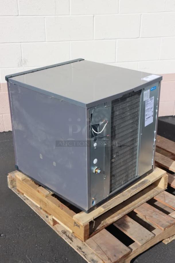 Scotsman NS0422A-1B Prodigy Plus 22" air-cooled nugget ice machine, 420 lb capacity, 115V, on wooden pallet, visible serial number.