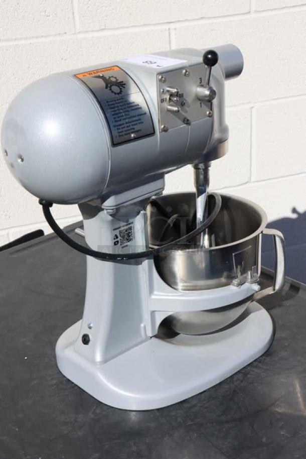 Brand new Hobart N50-60 5 Qt. countertop mixer, unboxed, with bowl lift. Minor scratches. 1/6 hp, 120V, 348W.