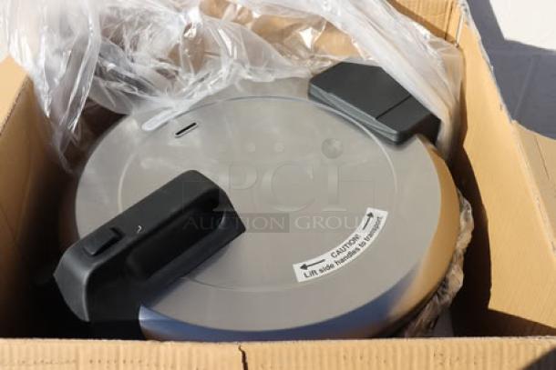 Brand new Avantco RCSB90 digital rice cooker, 90 cup capacity, 240V, 2,500W, in original packaging with hinged lid.