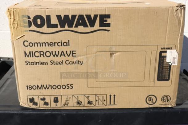 Brand new Solwave EM025FJT-S0SA00 commercial microwave in box, stainless steel, 1,000 watts, push button controls, 120V.