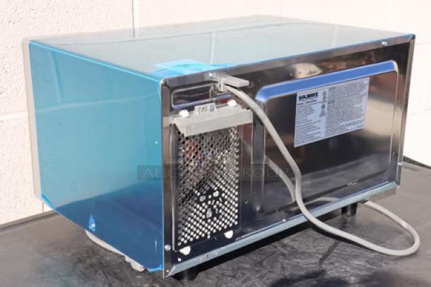 Brand new Solwave EM025FJT-S0SA00 stainless steel commercial microwave, 1000W, push button controls, original packaging.