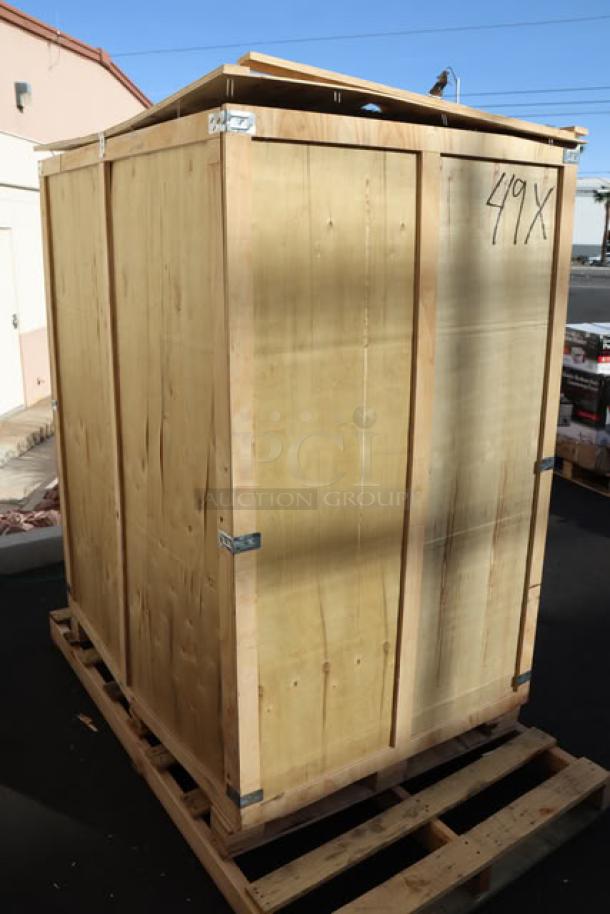 Wooden crate containing a brand new Avantco CAC-48 refrigerated merchandiser. Glass damaged; serial number 1748109080001.