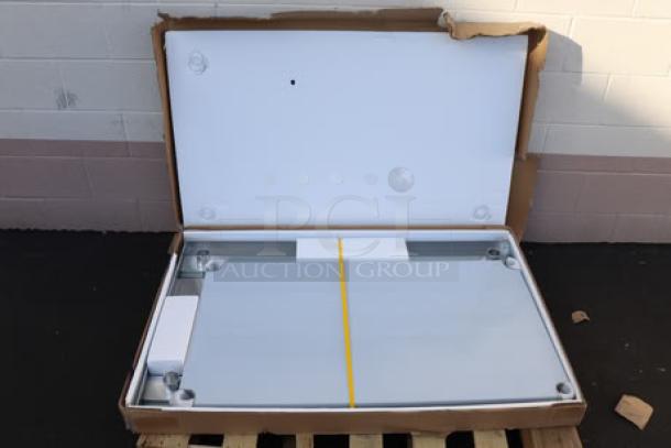 Brand new Regency 30" x 48" 16-Gauge 304 Stainless Steel Commercial Work Table with undershelf, model 600TS3048S, in packaging.
