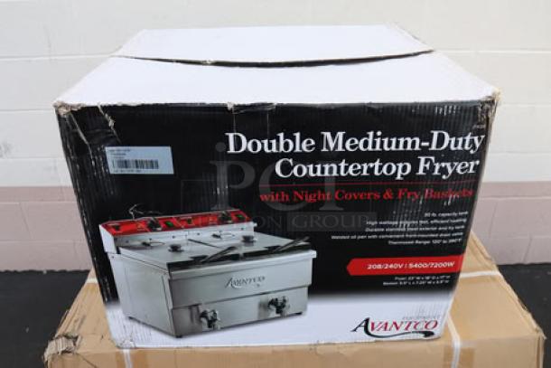 BRAND NEW Avantco F202 30 lb. Dual Tank Electric Countertop Fryer in damaged packaging; may have scratches and dents. Serial No. CK-241107R-281.