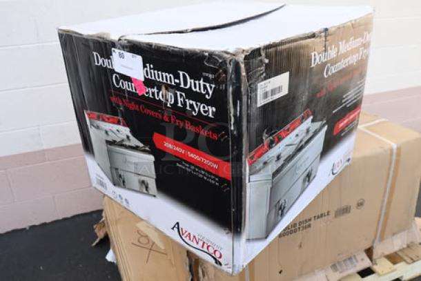 Brand new Avantco F202 30 lb. dual tank electric fryer in damaged packaging; possible scratches and dents. Model: F202, 208-240V.