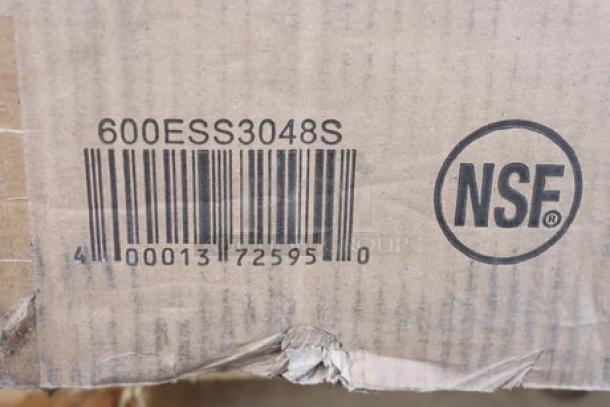 Barcode and NSF label on damaged packaging of Regency Spec Line ESS-3048-314 stainless steel equipment stand.