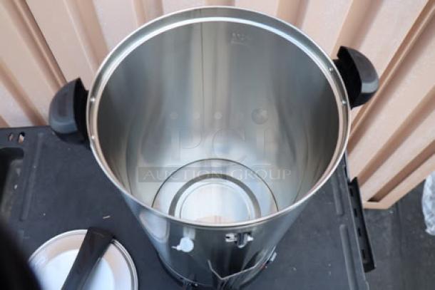 Brand new Avantco WB29L 7.6-gallon water boiler, stainless steel, 120V, 1500W, minor cosmetic scratches, open lid view.