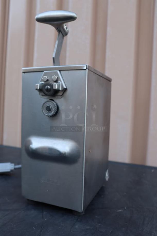 Brand new Edlund 203 two-speed tabletop electric can opener, serial number 111749. Original packaging damaged.