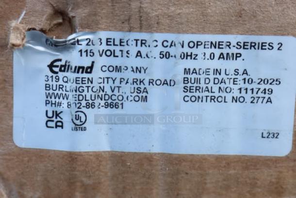 BRAND NEW Edlund 203 Two-Speed Tabletop Electric Can Opener, 115V, S/N: 111749. Original packaging damaged. Made in USA.