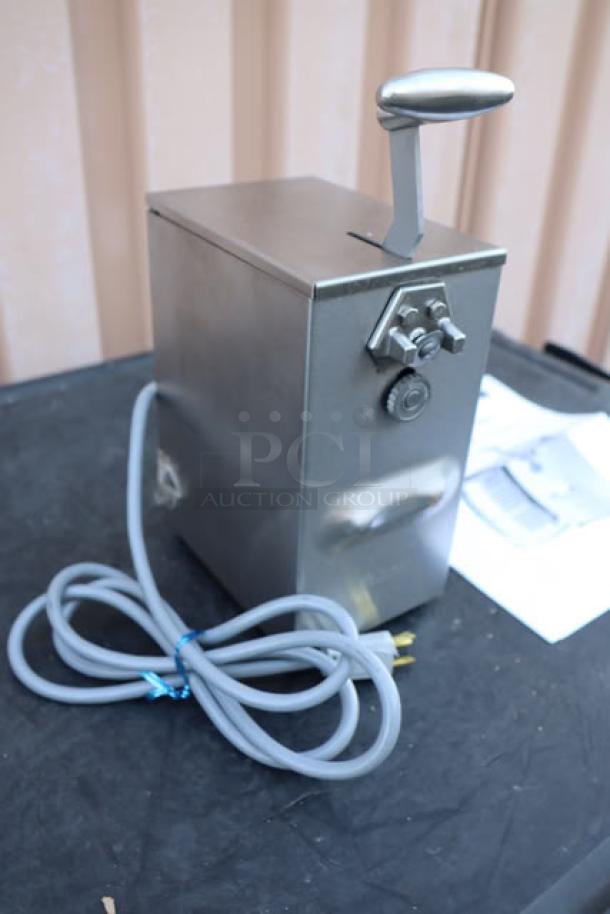 Brand new Edlund 203 electric can opener, two-speed, 115V, minor packaging damage, S/N: 111776, shown with power cord.