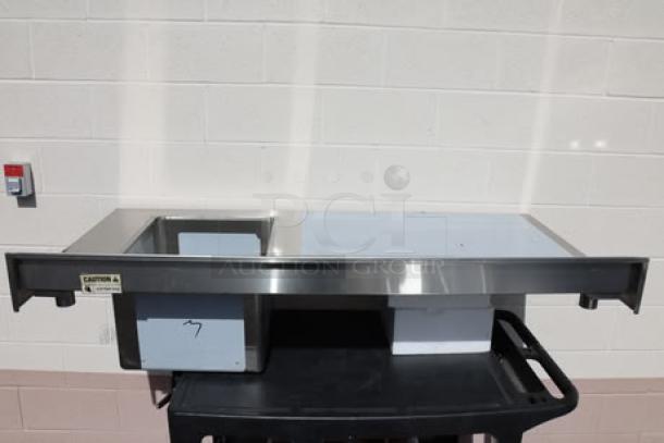 Brand new Regency 600STCB3060R work table, 30"x60", 16-gauge stainless steel, with right-side sink, no original packaging.
